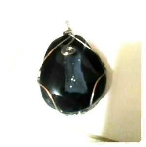 Onyx and quartz pendant